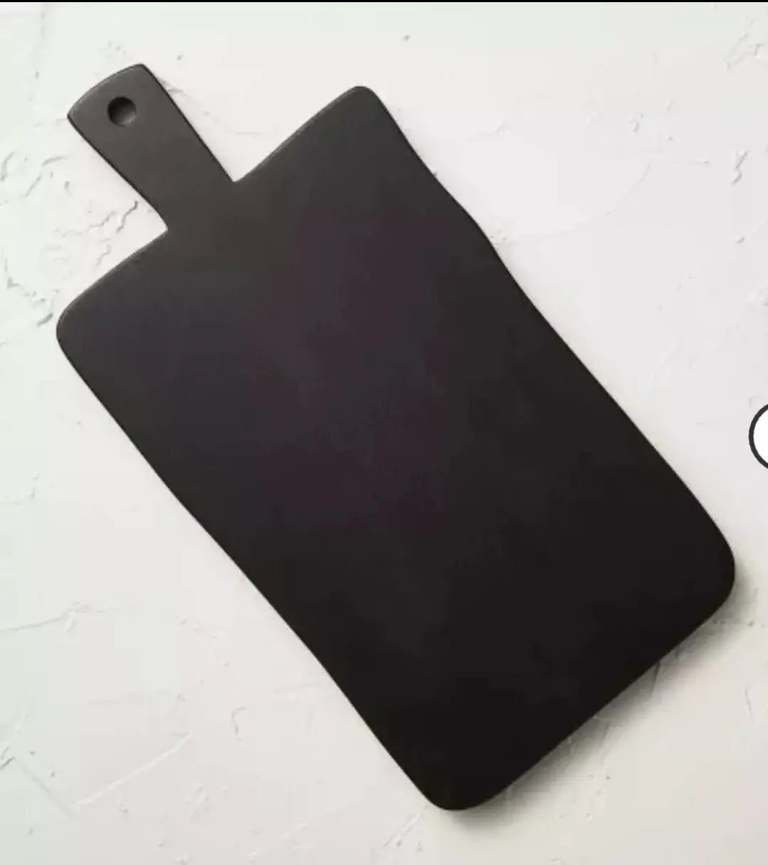 black wooden cheese serving board - 14" x 6.7" - Opalhouse™ on a light surface.