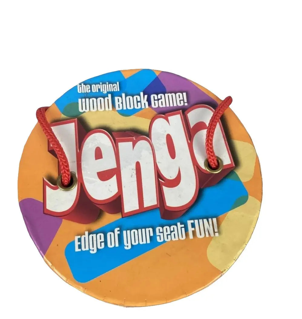 2006 JENGA the Original Wood Block Game - Parker Bros/Hasbro, colorful round sign advertising fun and excitement.