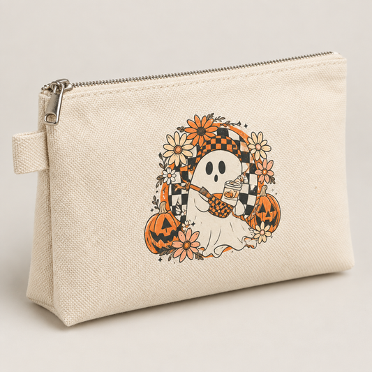 Three-quarter view showing the Halloween pouch canvas, zipper, and fabric loop