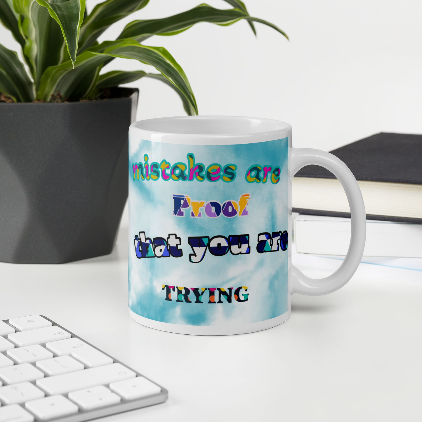 Colorful ceramic mug with motivational text, perfect for coffee or tea lovers. Dishwasher and microwave safe.