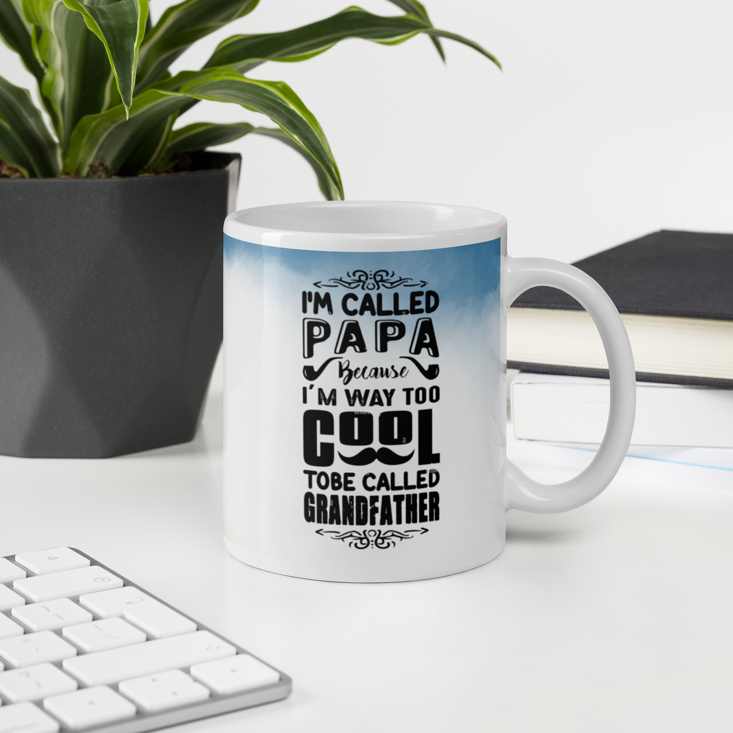 White ceramic mug with blue gradient, saying 'I'm called Papa because I'm way too cool to be called Grandfather.'