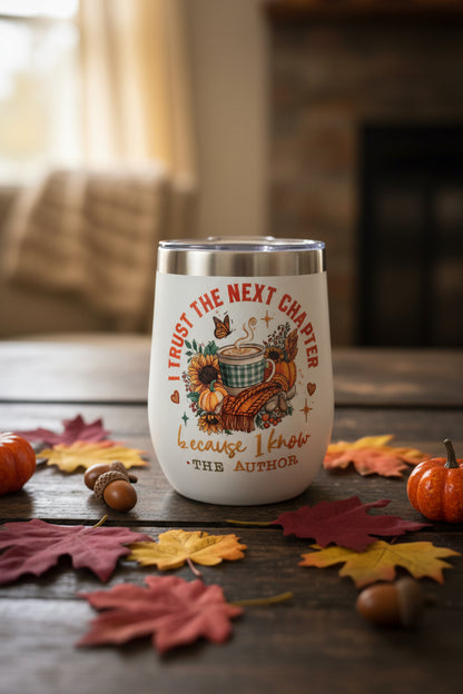 White stainless steel wine tumbler with fall-themed sublimation print reading I Trust The Next Chapter Because I Know The Author