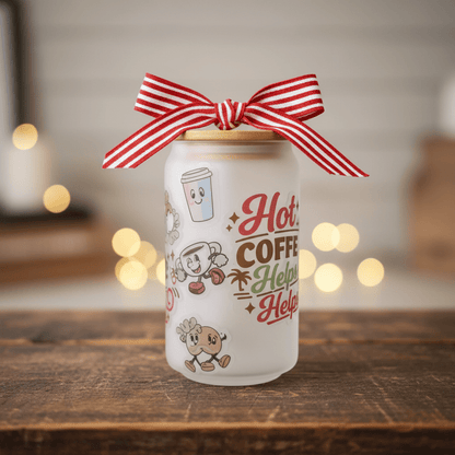 Hot Coffee Helps frosted glass tumbler with bamboo lid tied with a striped red ribbon on a wooden table.
