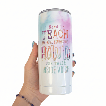 Funny stainless steel tumbler with colorful design and humorous quote about facial expressions.