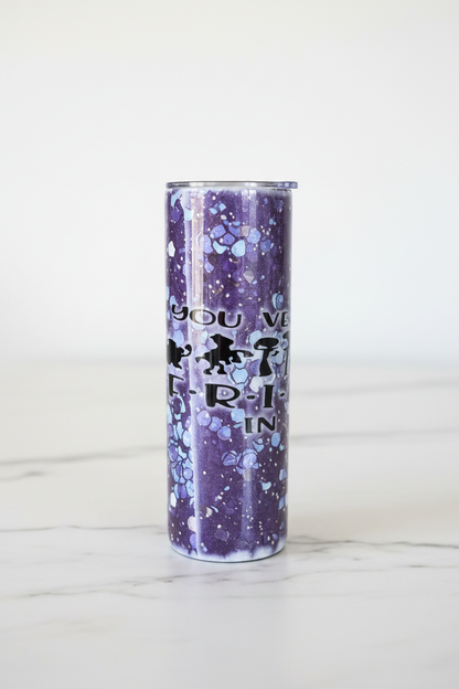 20oz purple glitter tumbler featuring 'You've Got a Friend in Me' design on a marble countertop.