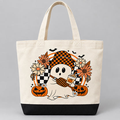 Cream tote bag with a Halloween ghost wearing a checkerboard witch hat, surrounded by pumpkins, flowers, and bats