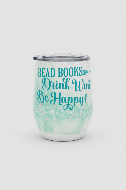 Handmade wine tumbler for book lovers with teal lettering and pastel glitter. Perfect for enjoying wine while reading.
