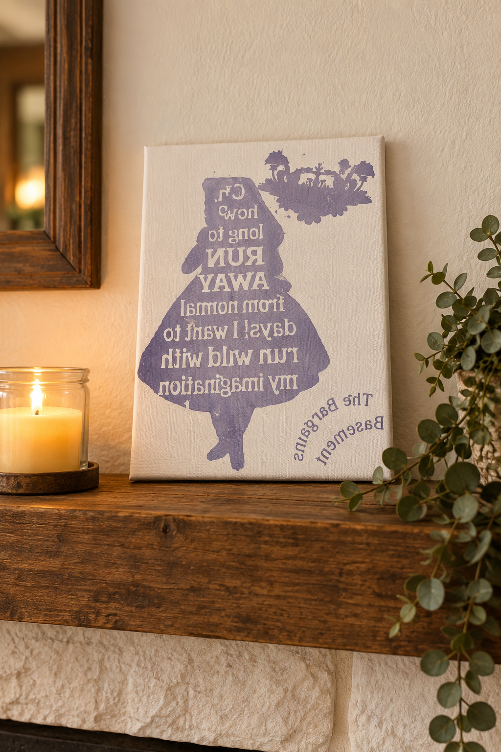 Run Wild with My Imagination canvas sign on a wooden mantel with a candle and greenery