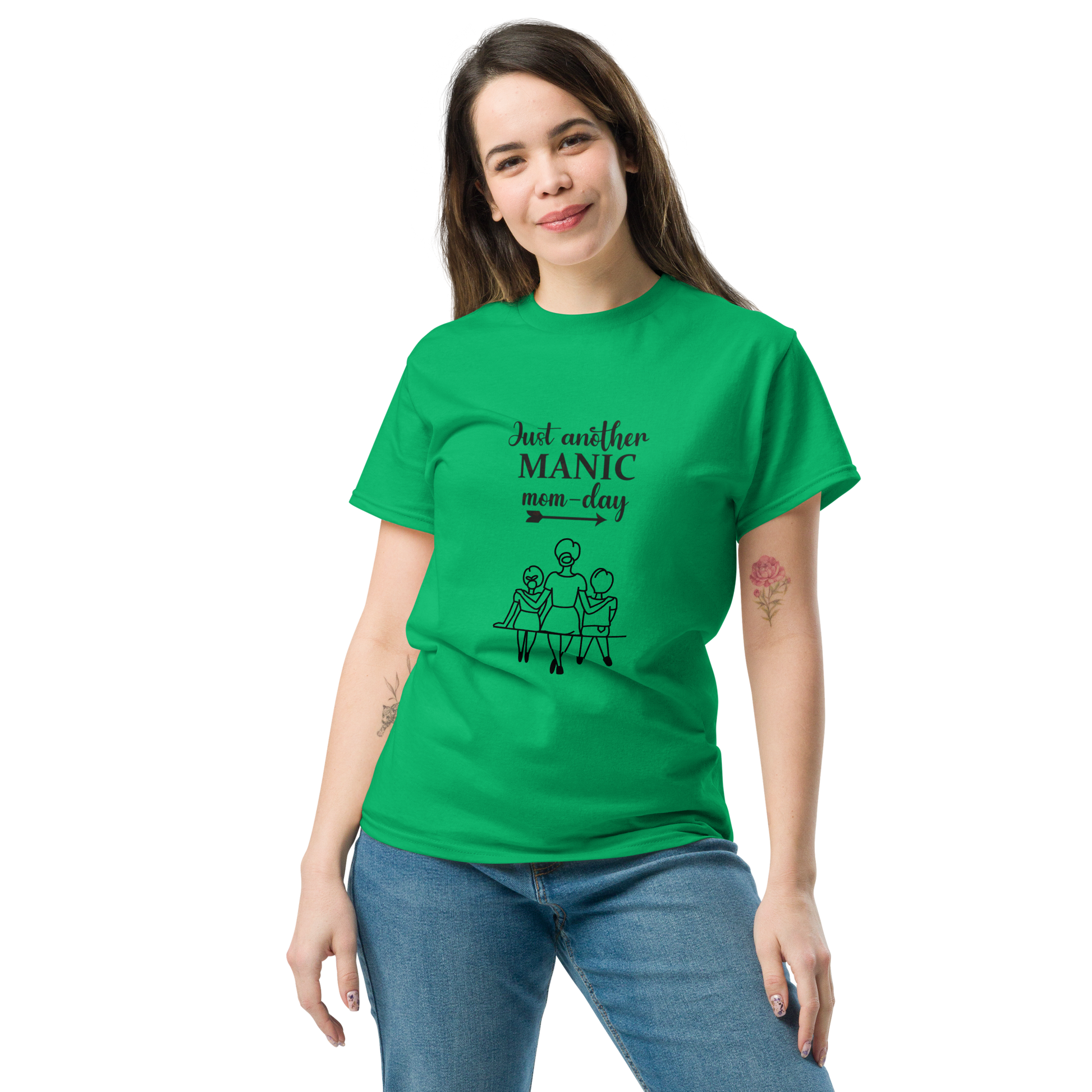 Green unisex classic tee, 100% cotton, featuring 'Just another MANIC mom-day' print, perfect for trendy outfits.
