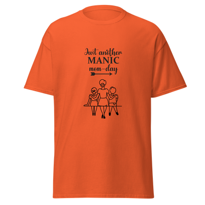Orange unisex classic tee with 'Just another MANIC mom-day' graphic, perfect for casual streetwear. 100% cotton and breathable.